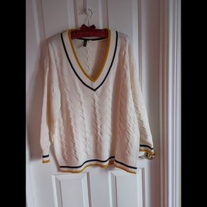 Women sweater H&M. White with yellow and black details. Size regular L.